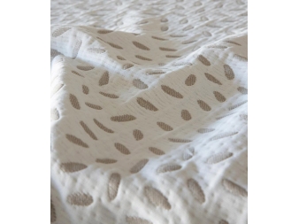 Tela Mikonos de Tejidos JVR. Piqué jacquard beige