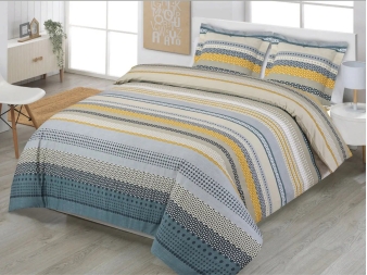 Funda Nórdica Karima de Dhestia Home con diseño geométrico y de rayas en cama de matrimonio