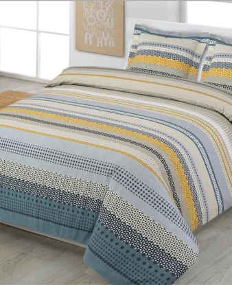 Funda Nórdica Karima de Dhestia Home con diseño geométrico y de rayas en cama de matrimonio