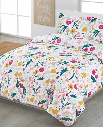 Funda Nórdica Florenzia de Dhestia Home con estampado floral vibrante en cama de matrimonio
