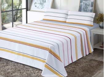 Juego de Sábanas Xàbia Dhestia Home con diseño de rayas multicolor en el dormitorio