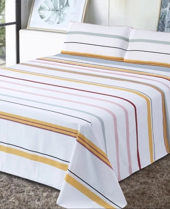 Juego de Sábanas Xàbia Dhestia Home con diseño de rayas multicolor en el dormitorio