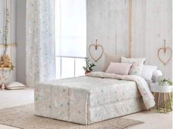 Edredón conforter Misty Beige en cama infantil – Confecciones Paula