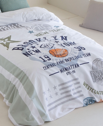 Sábanas Basket Confecciones Paula en cama juvenil