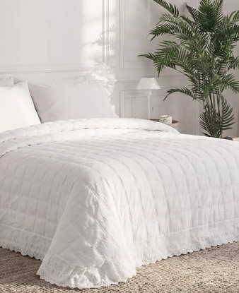 Colcha Boutí Garment Wash LN de Manterol en cama vestida