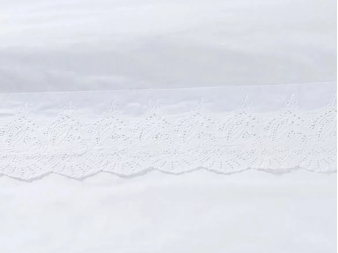 Juego de sábanas Garment Wash LN de Manterol en cama vestida