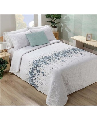 Colcha floral reversible Hedera de Manterol sobre cama de matrimonio