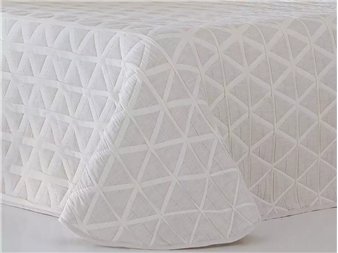 detalle tejido jacquard colcha nilo beige