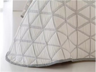 detalle tejido jacquard colcha nilo gris
