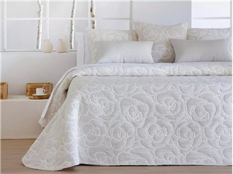 colcha loto beige de entretiempo en cama jvr