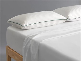 almohada bambu velfont fibra reciclada sobre cama